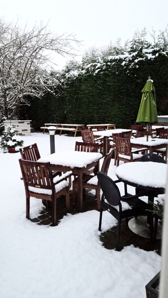 Christmas: Snow in the Pub Garden